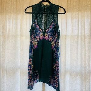Free People Marsha Printed Lace-Neck Slip Dress in the ecru combo colors. Size M